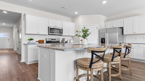 kitchen with white cabinets