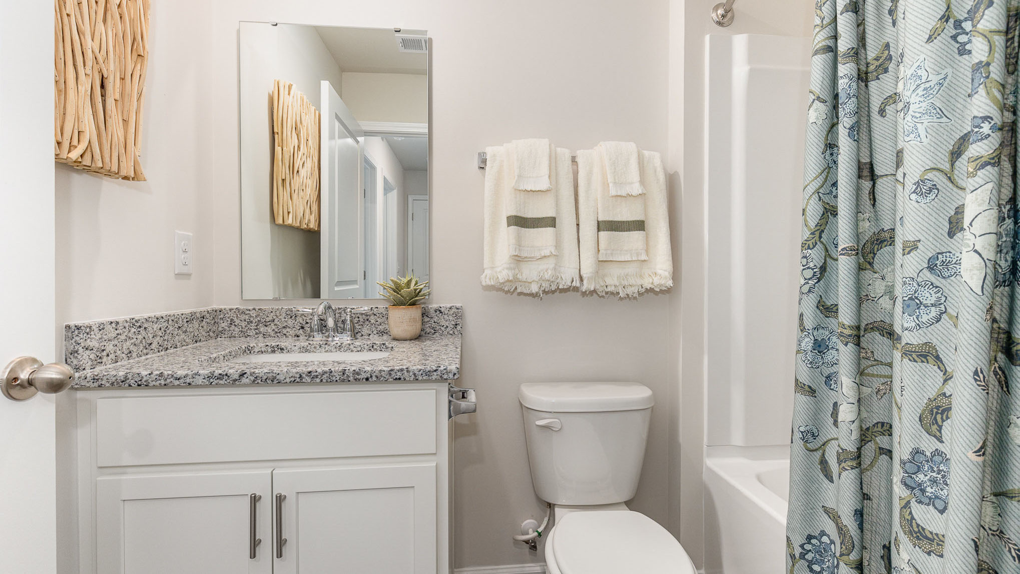 bathroom with quartz counters
