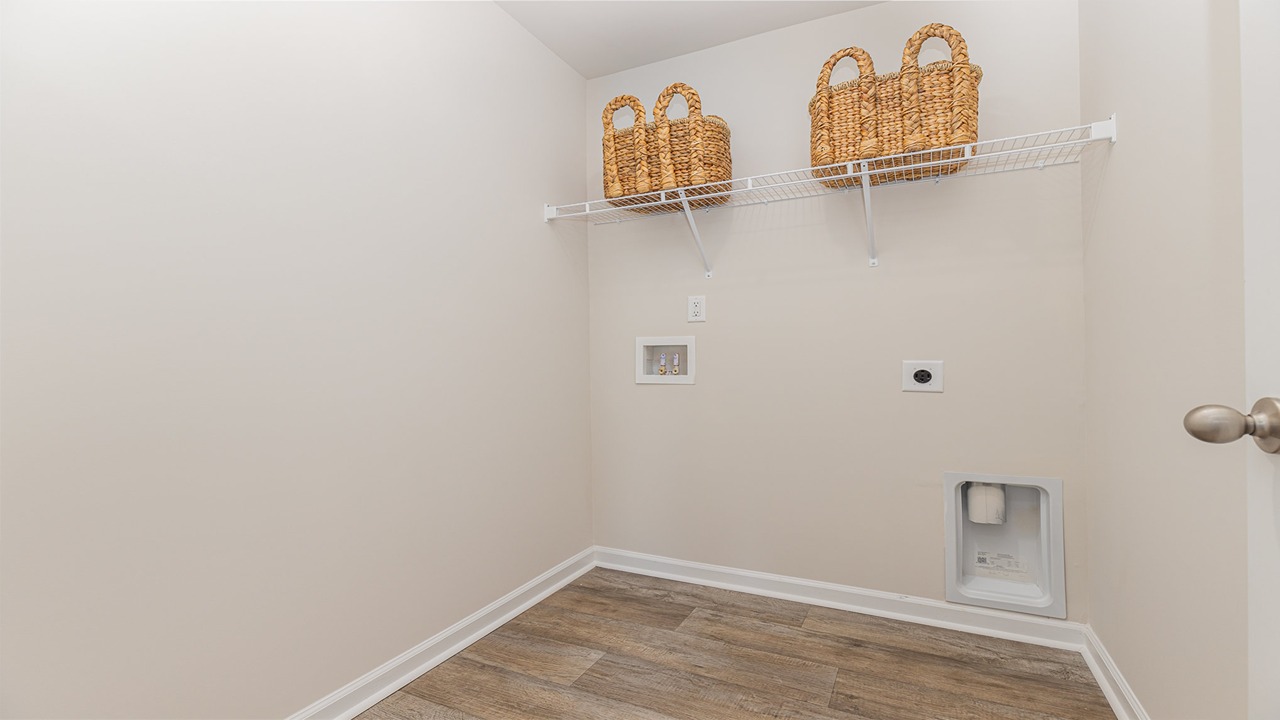 laundry room with wire shelving
