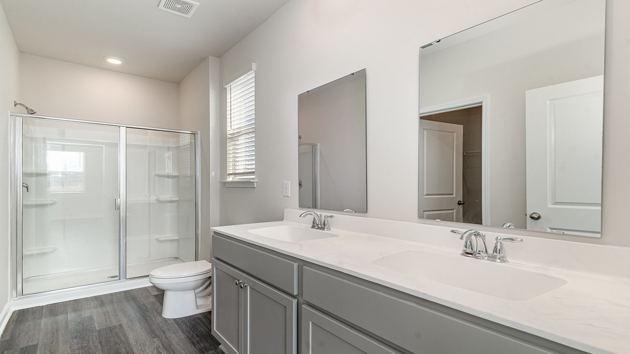 bathroom with quartz counters