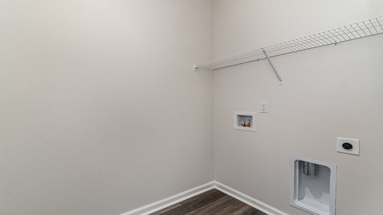 laundry room with wire shelving