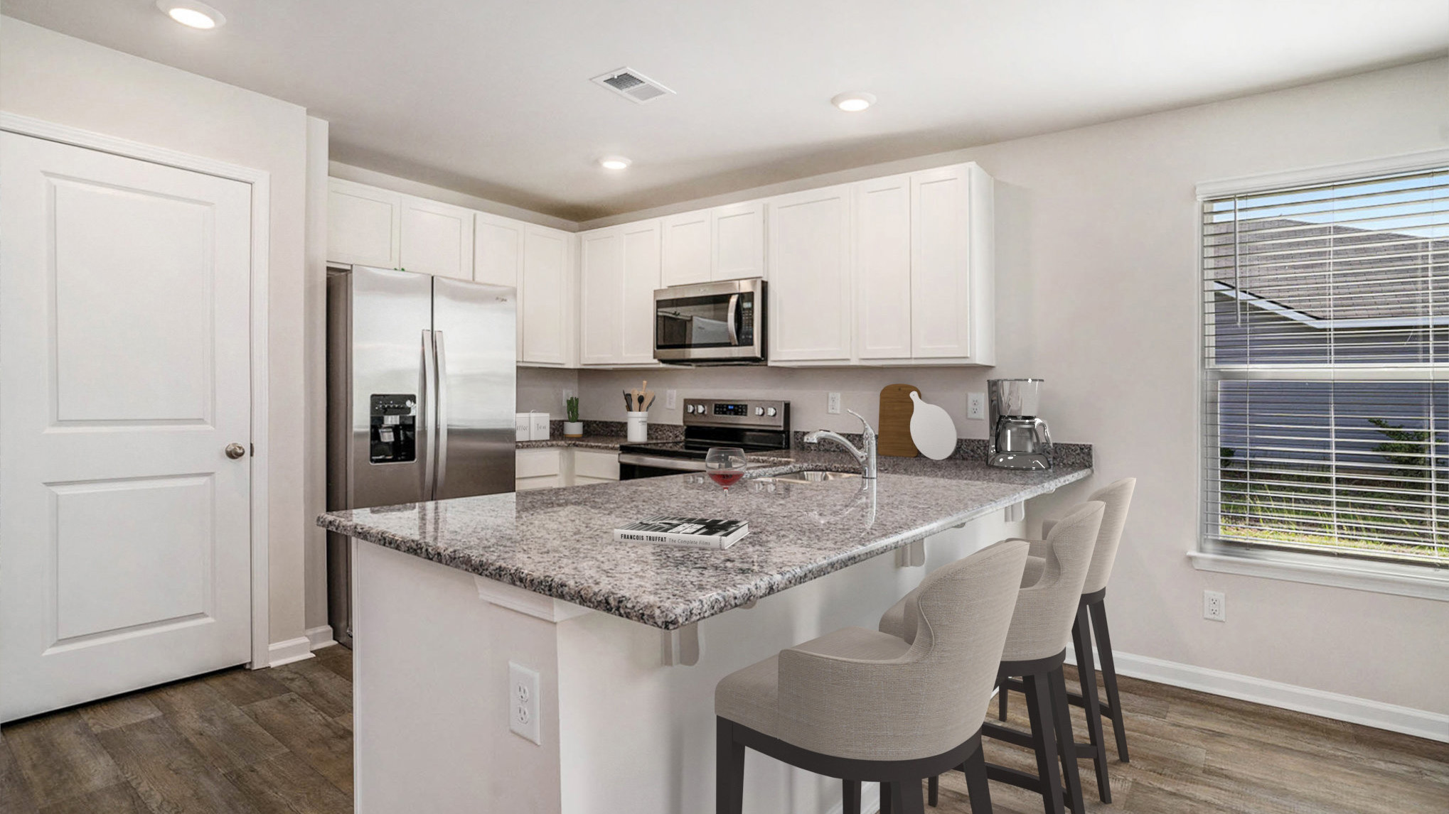 kitchen with white cabinets