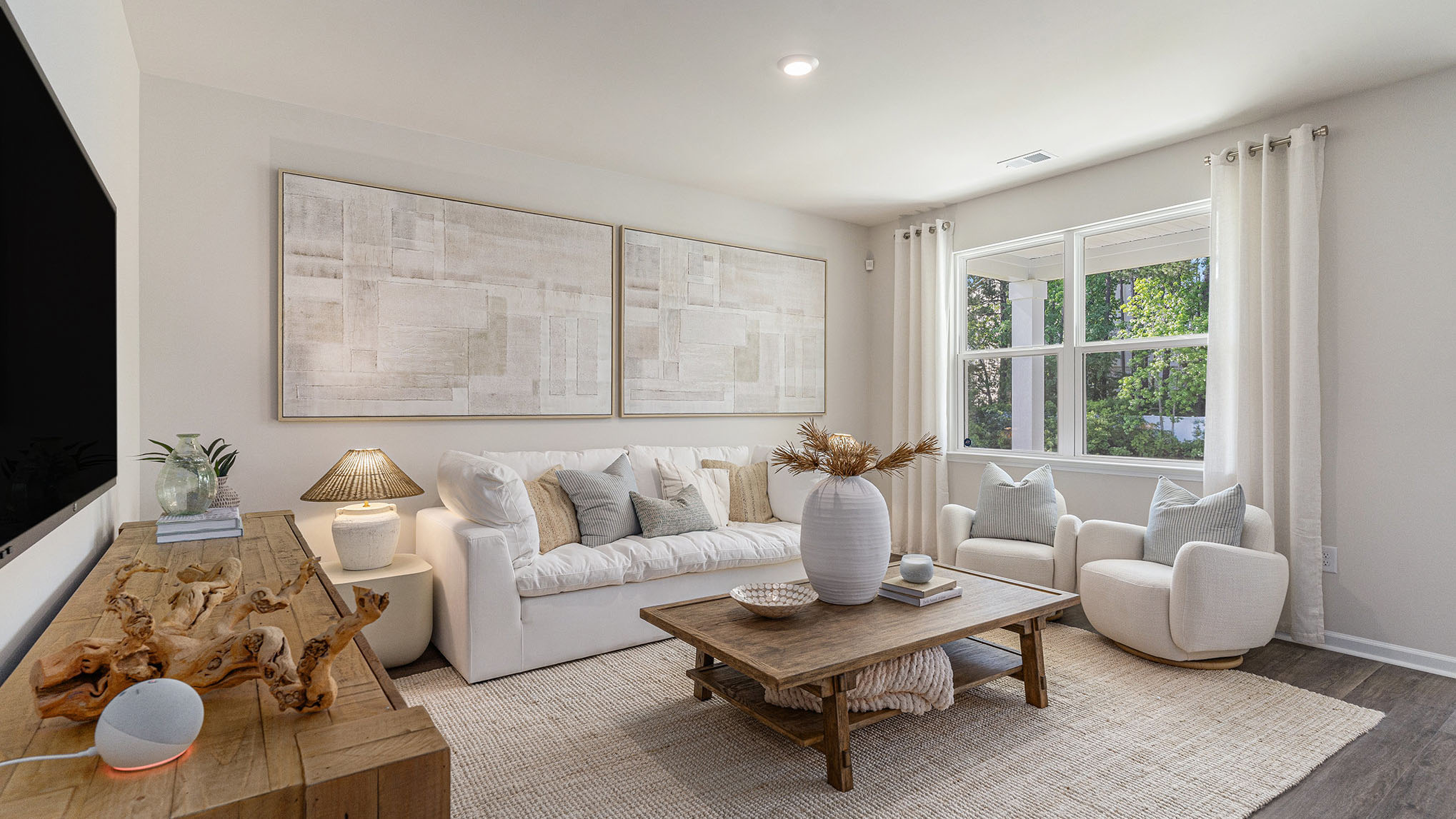 living room with ample lighting