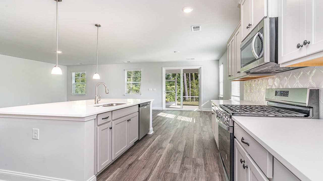 kitchen with gray cabinets and granite countertops