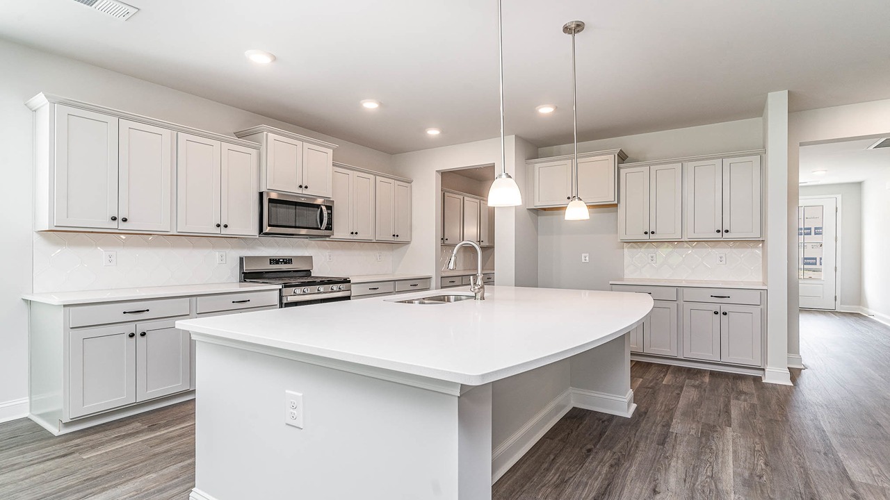 kitchen with gray cabinets and granite countertops