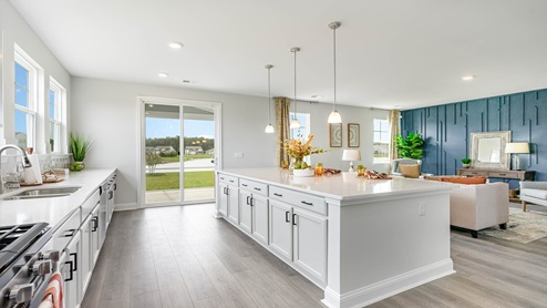 kitchen with white cabinets and granite countertops