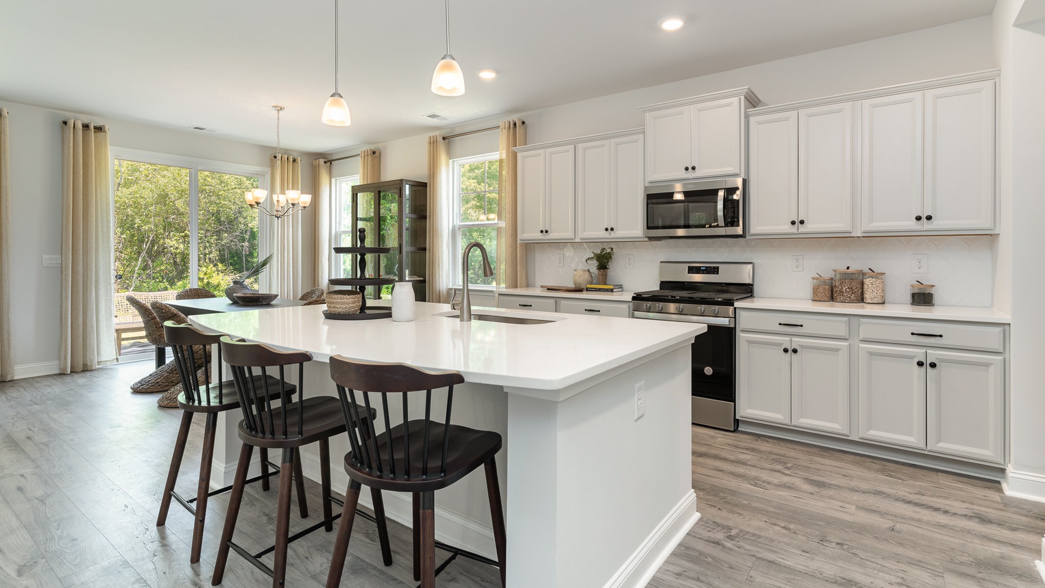 kitchen with gray cabinets and granite countertops