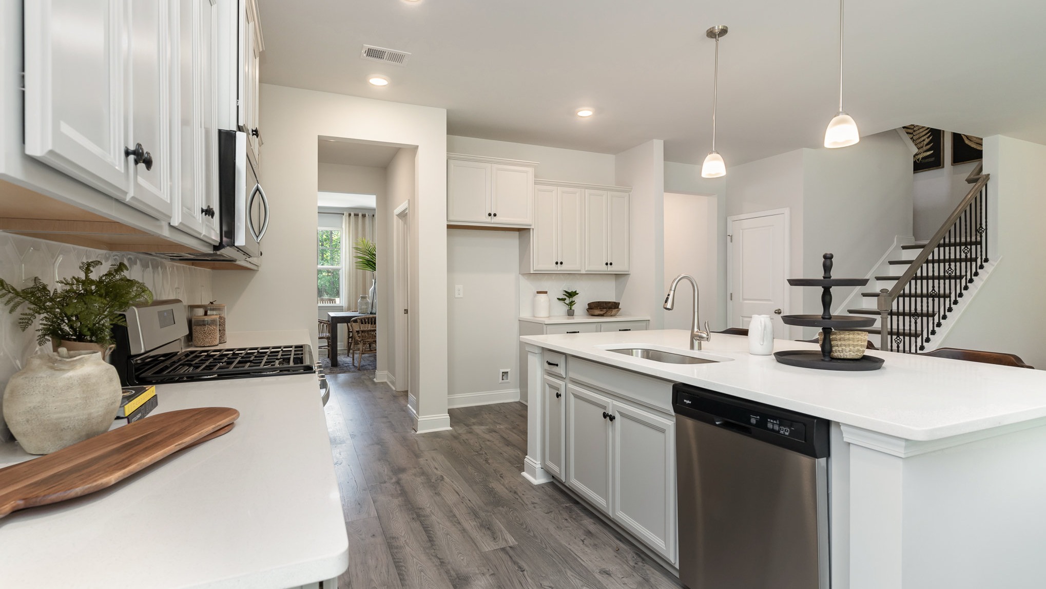kitchen with gray cabinets and granite countertops