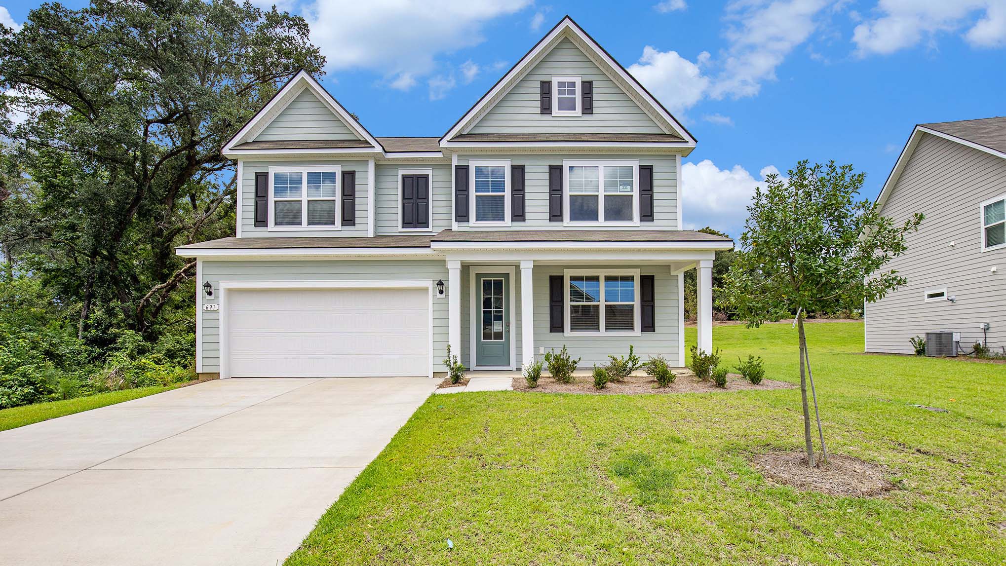 two-story home with front porch