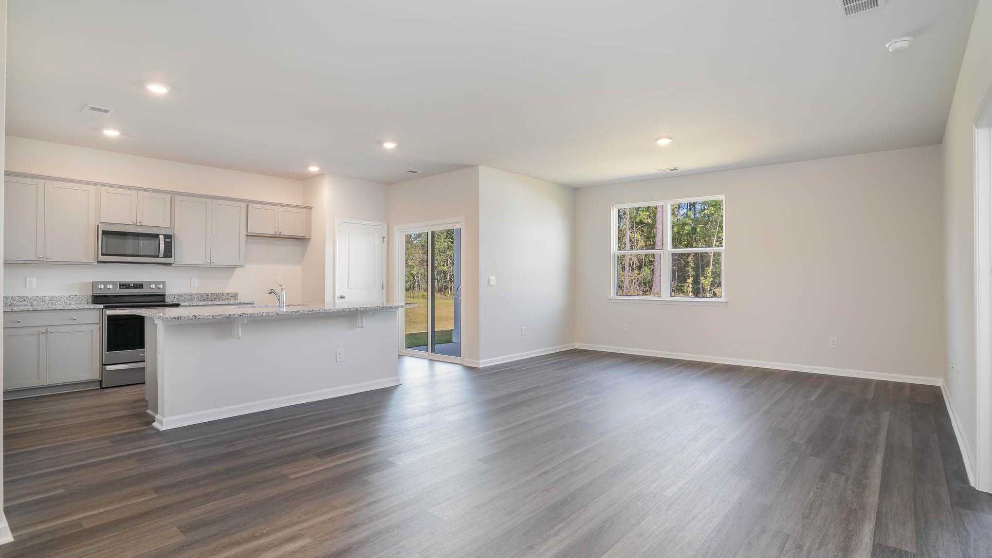 living room with ample lighting