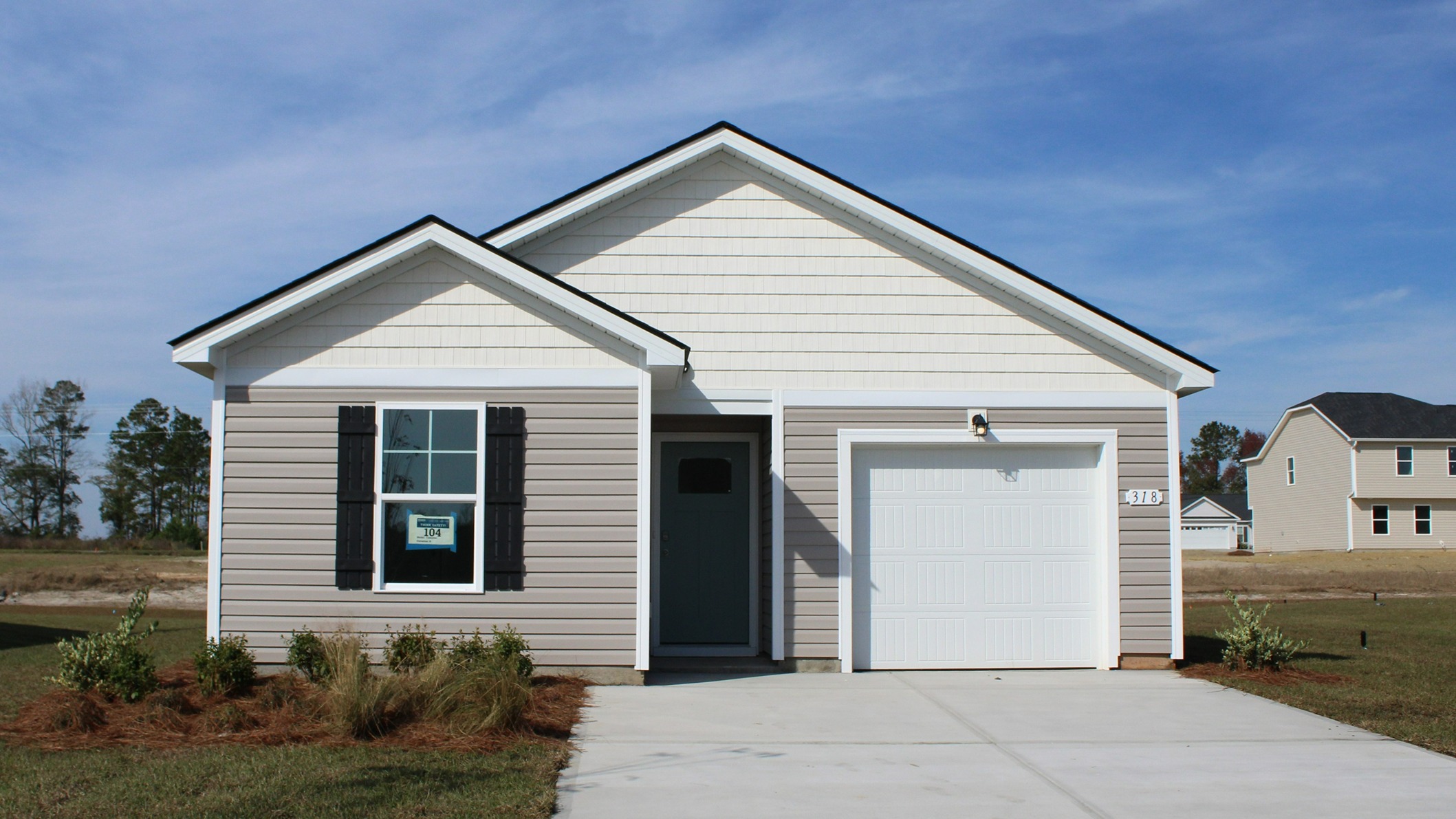 Single story home with vinyl siding
