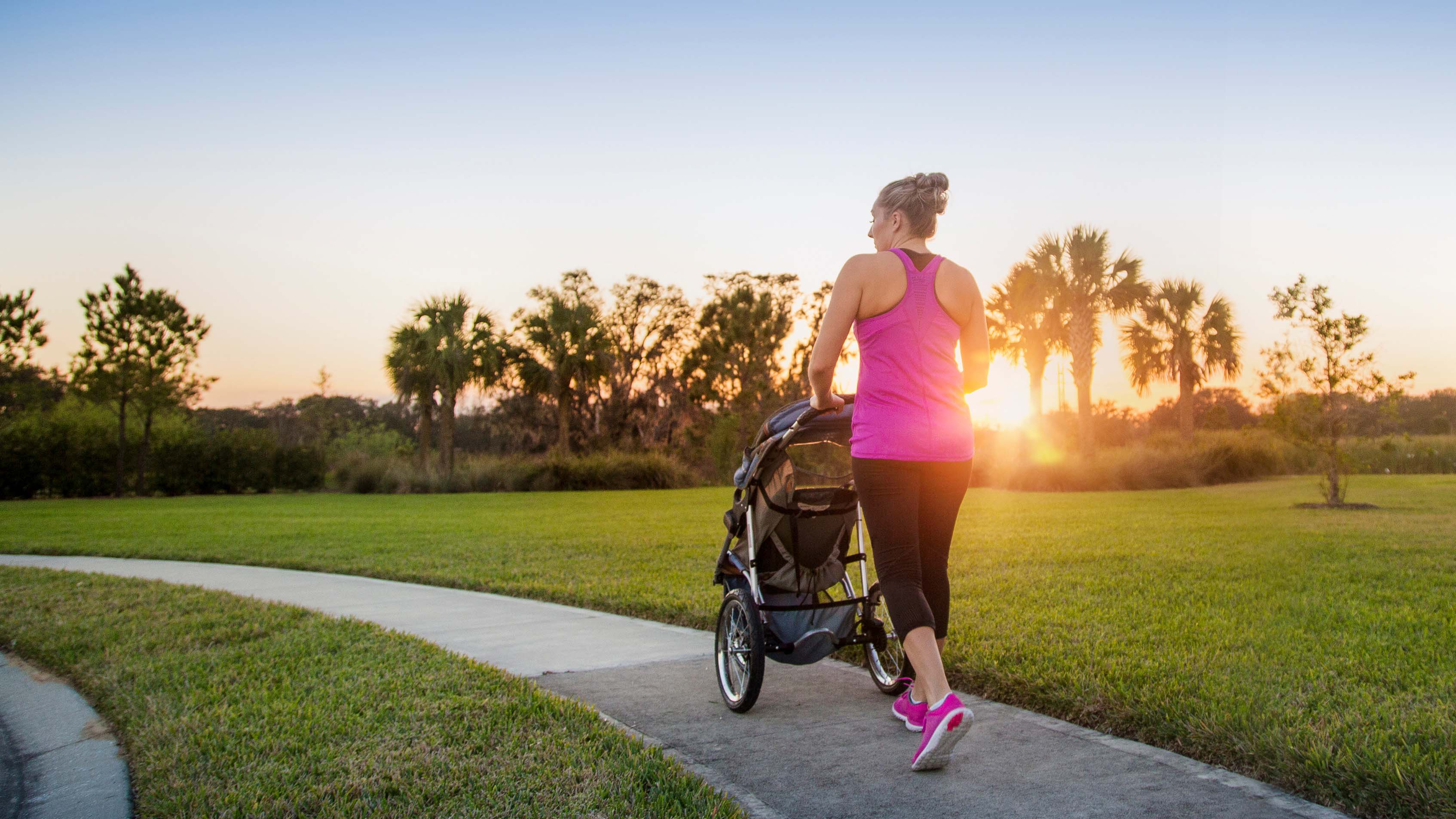 mom pushing stroller