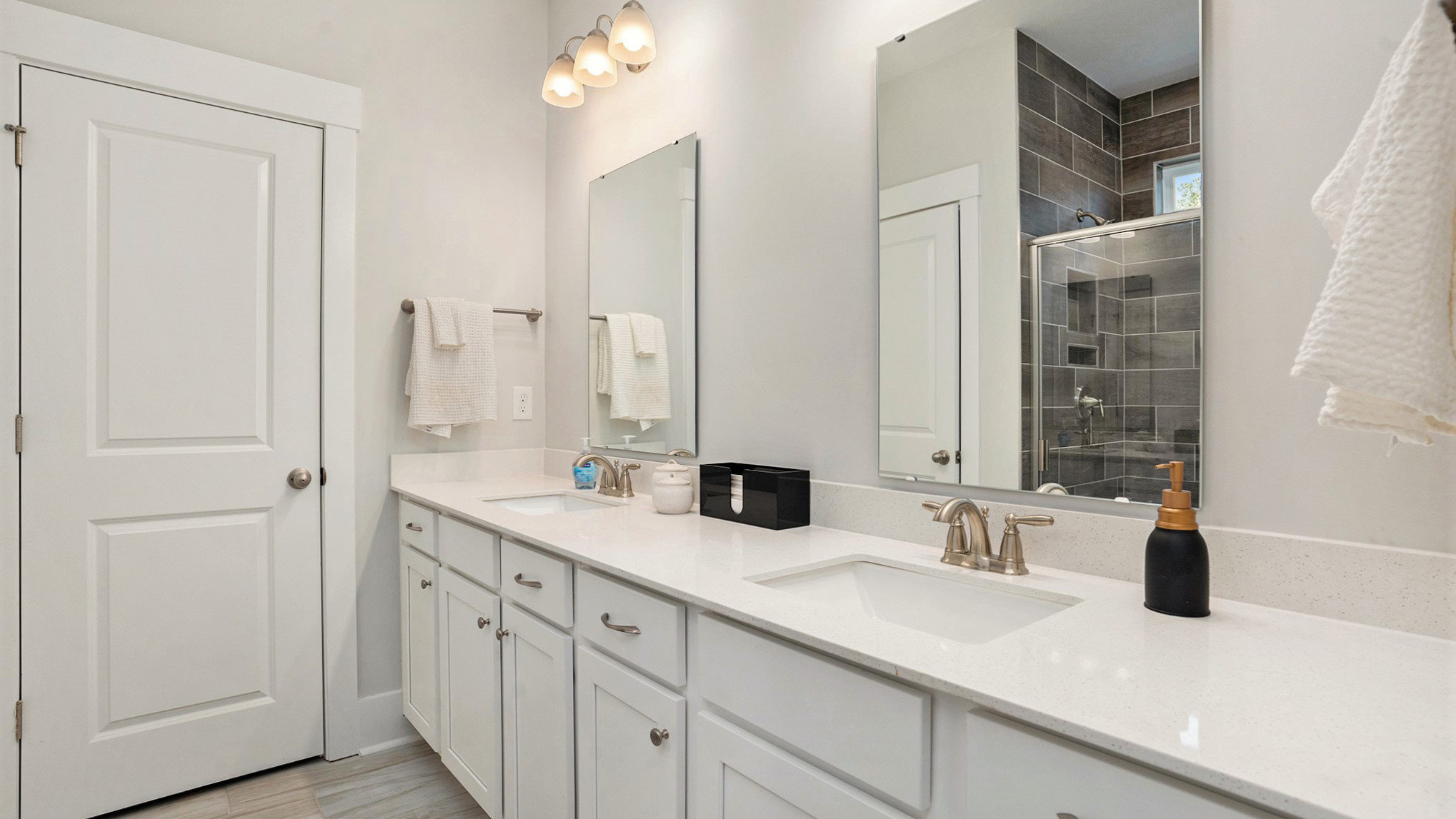 bathroom with quartz counters