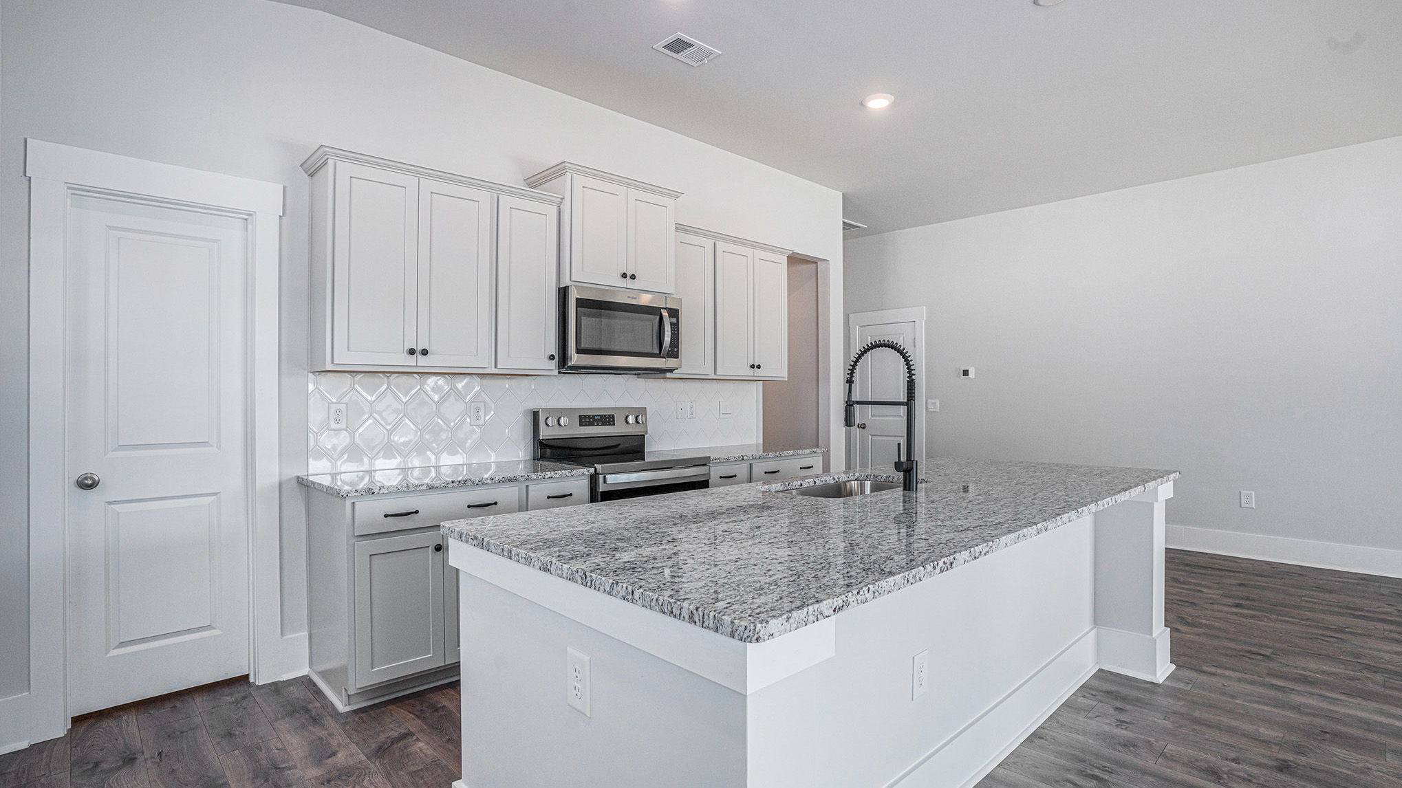 Eaton with craftsman at Coastal Farms