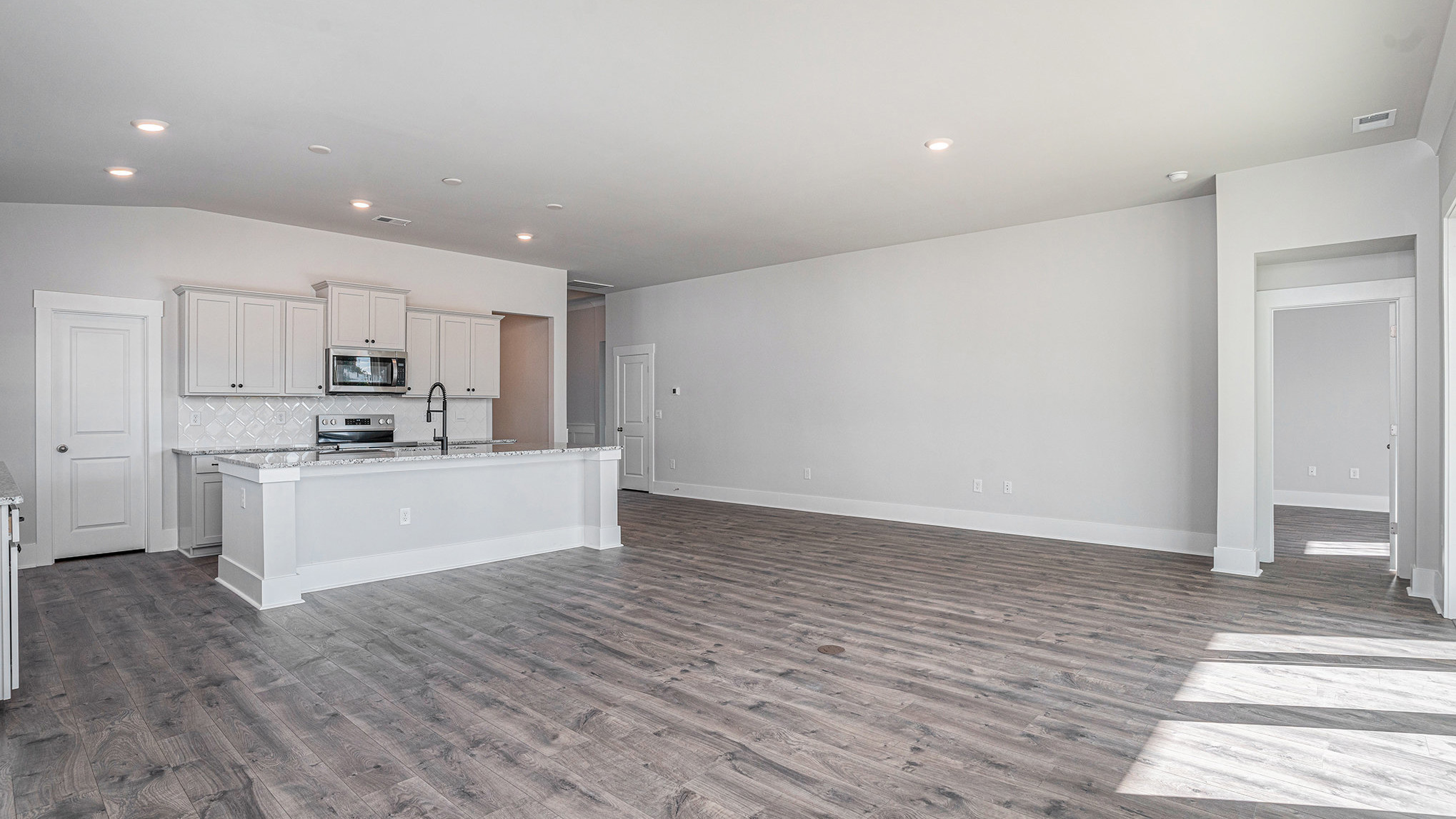 Eaton with craftsman at Coastal Farms