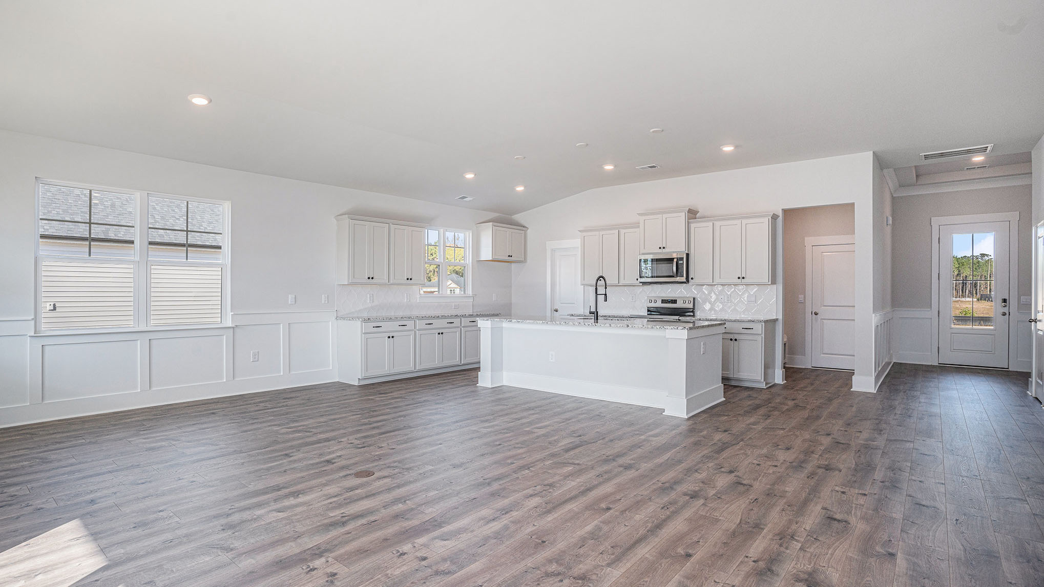 Eaton with craftsman at Coastal Farms