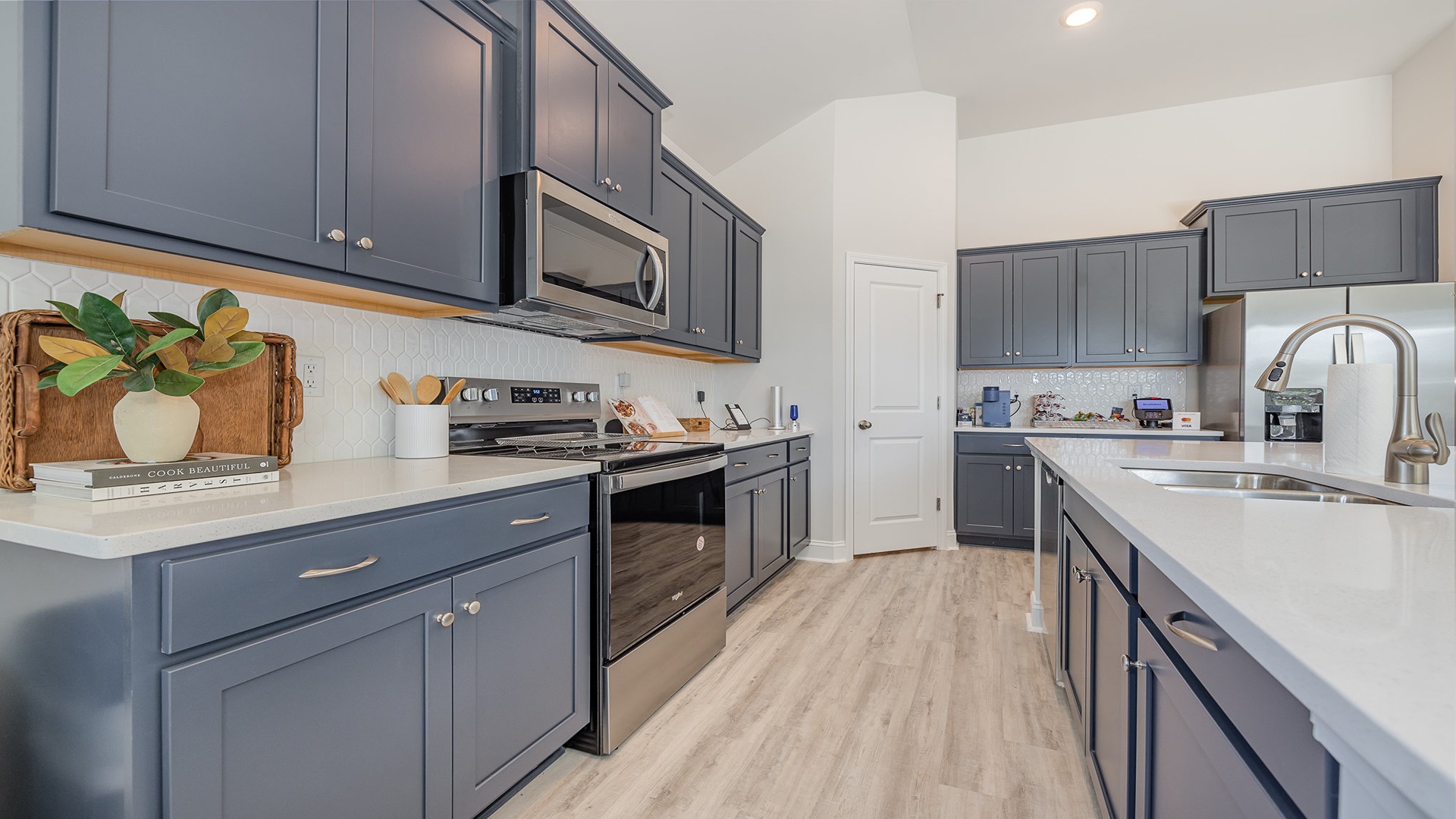 kitchen with navy cabinets