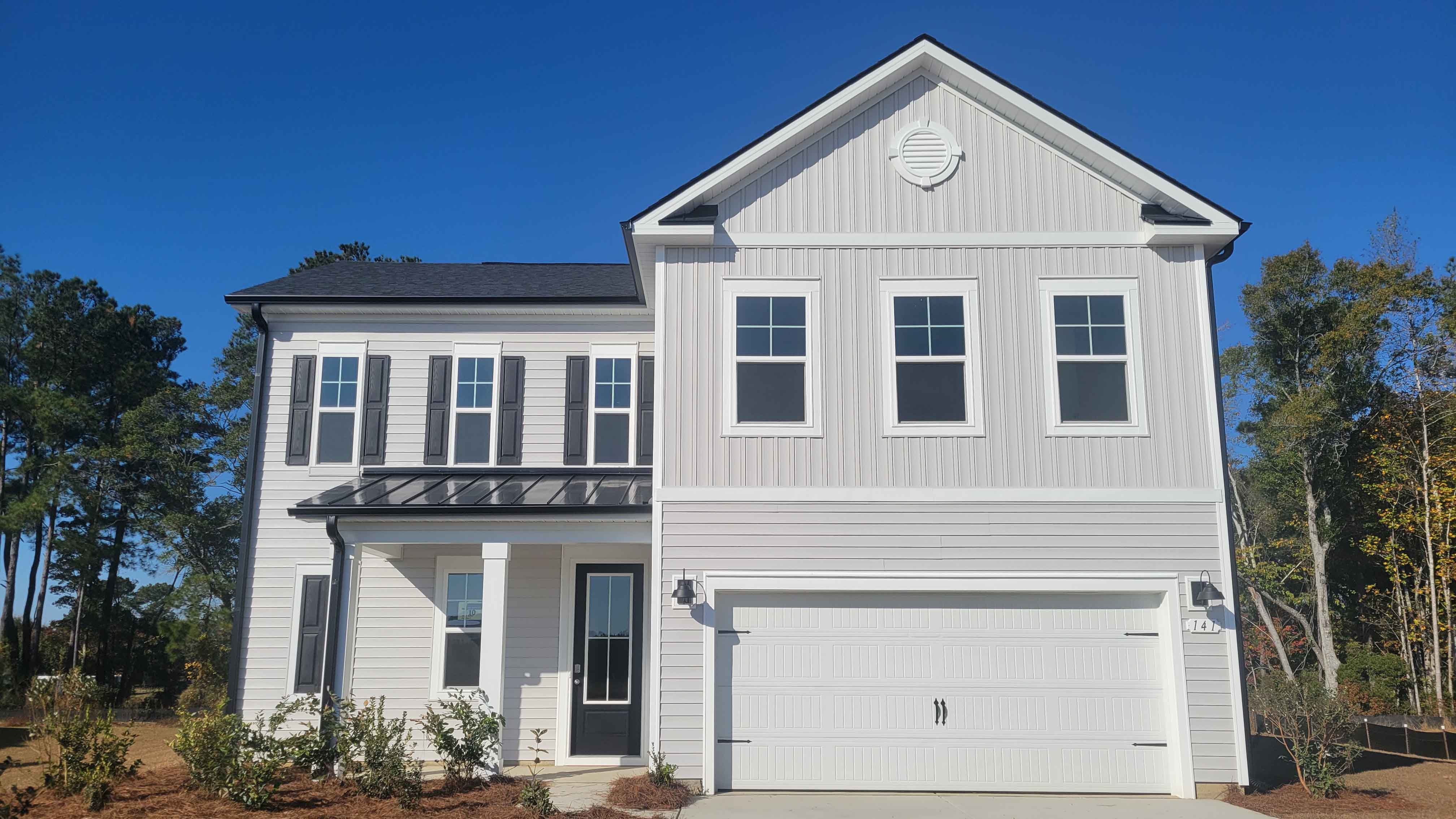 two story home with vinyl siding
