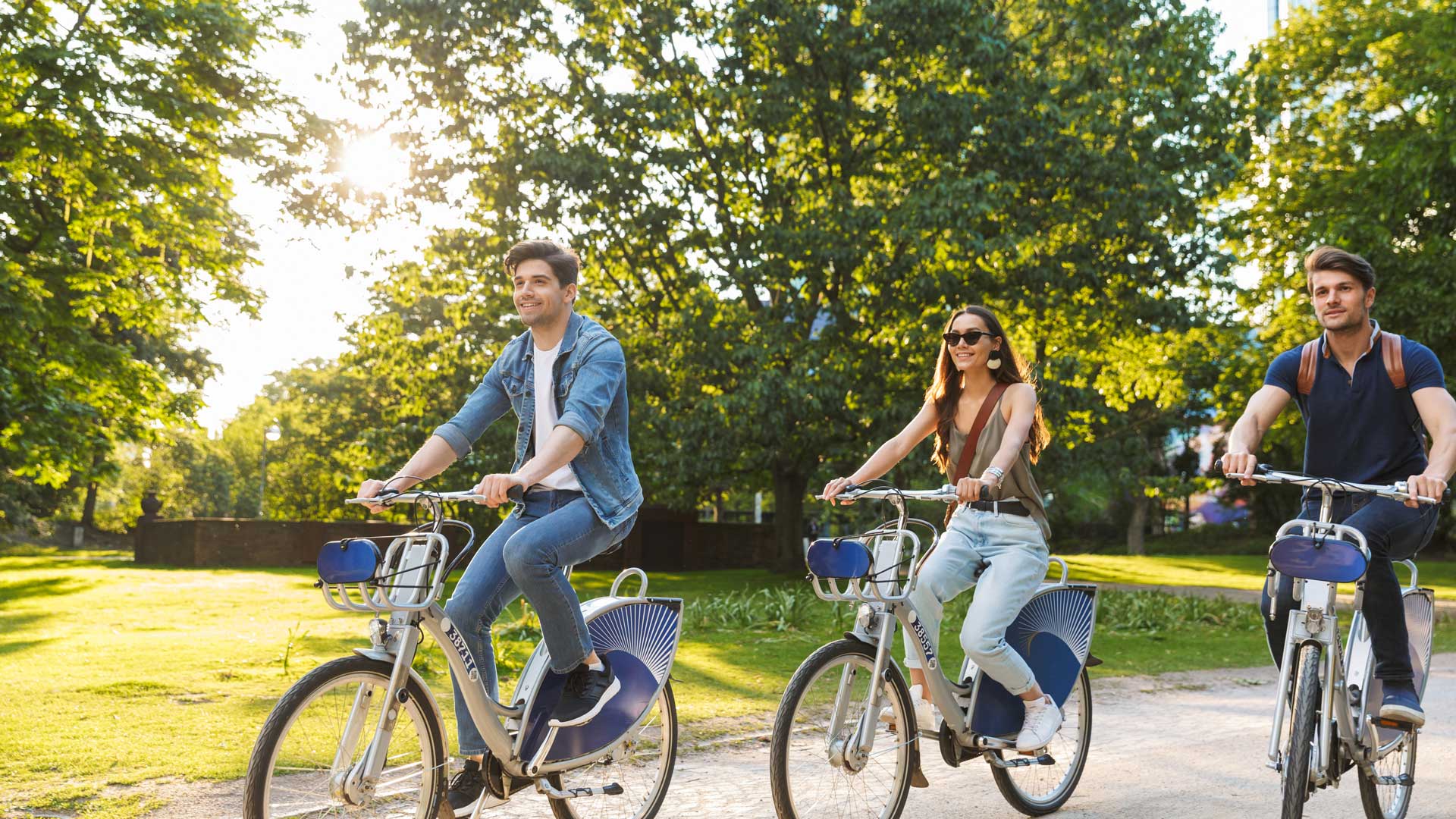 happy friends riding bikes