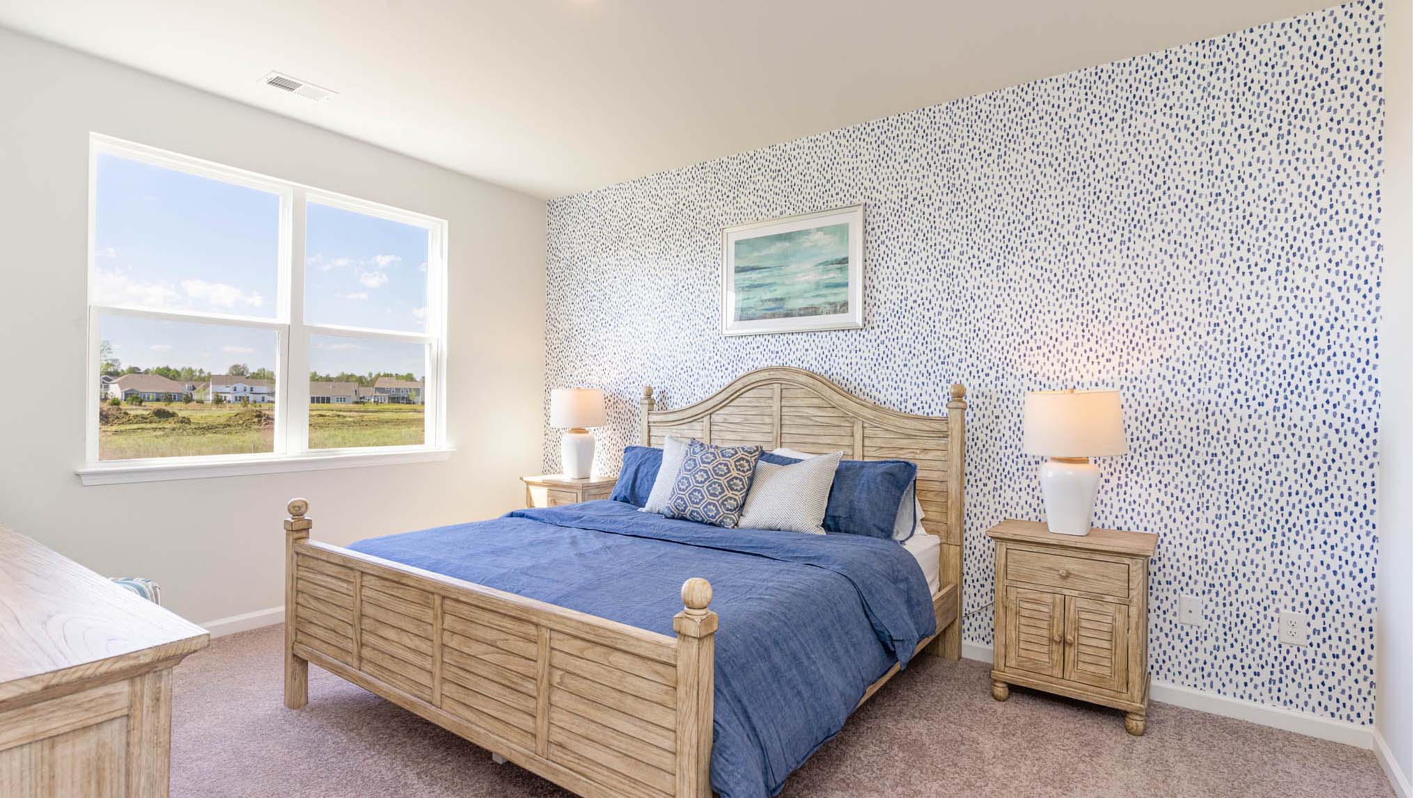 primary bedroom with double window