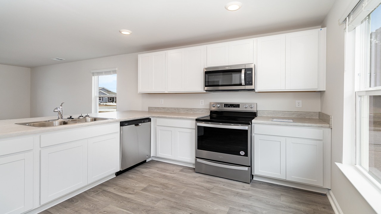 kitchen with white cabinets