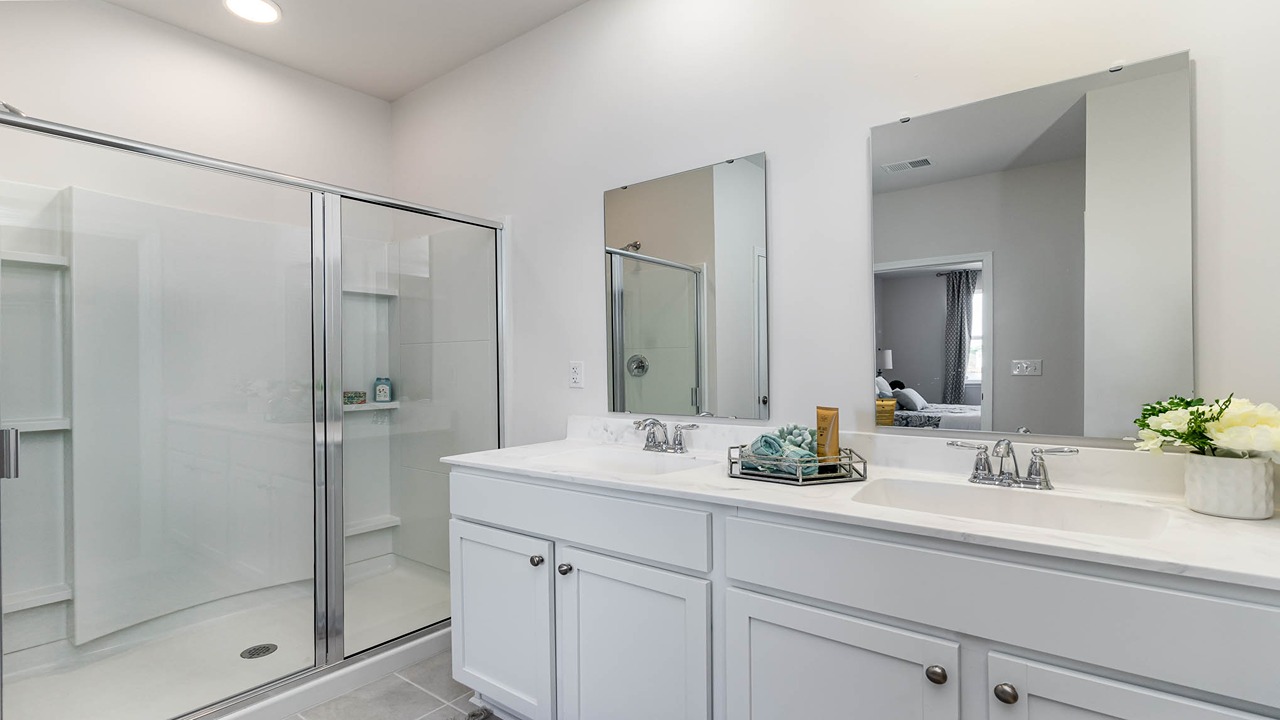 primary bathroom with walk in shower
