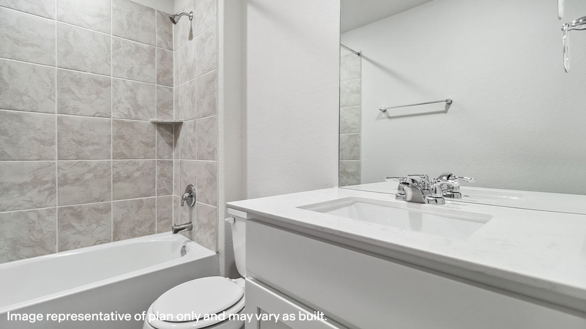 Second full bathroom with combined bathtub and shower, toilet, and single vanity sink.
