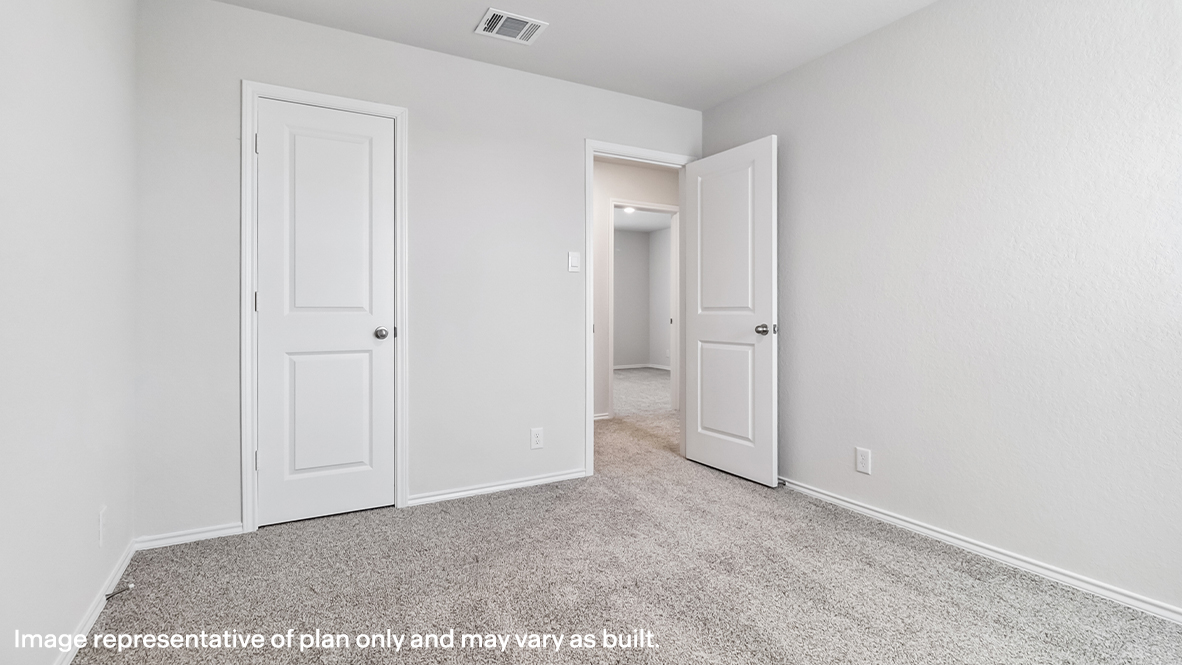 Fourth bedroom closet with shelving.