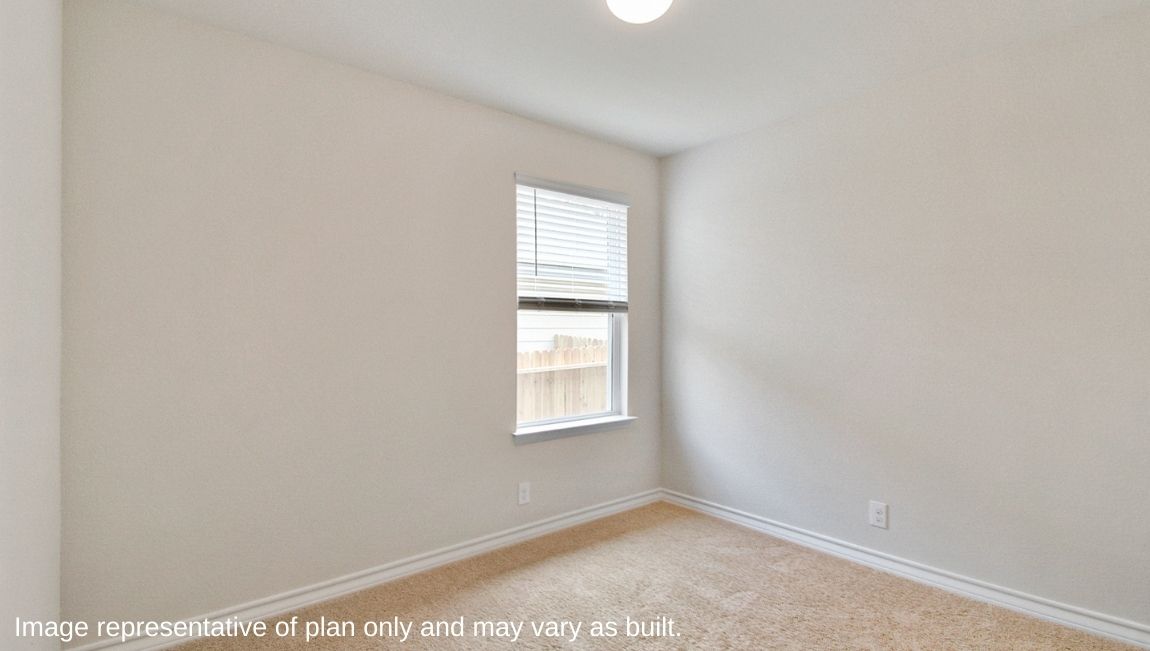 Third bedroom with carpet, window and closet.