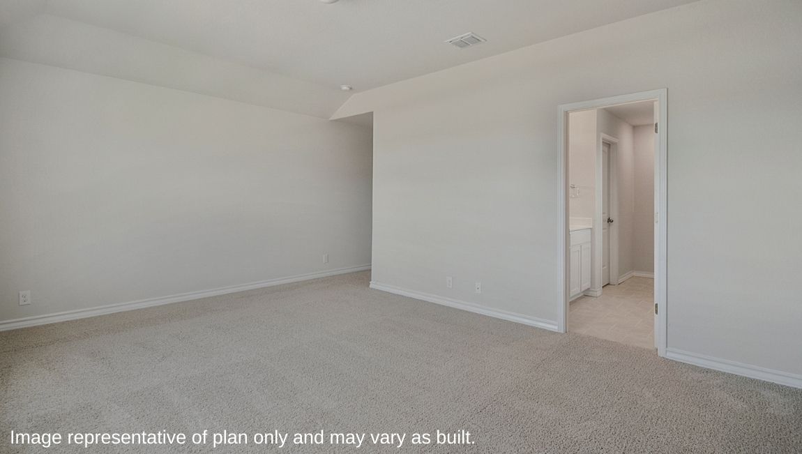Large, spacious kitchen with tons of cabinet storage and countertop space.