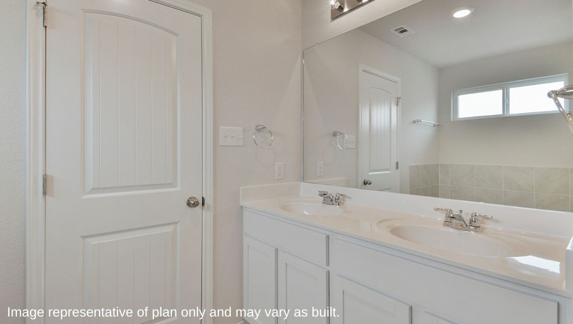 Spacious kitchen with classic white subway tile backsplash, sink facing large window and spacious corner pantry.