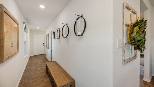 Floresville Links at River Bend New Construction Homes long entry to open floor concept leading to large kitchen