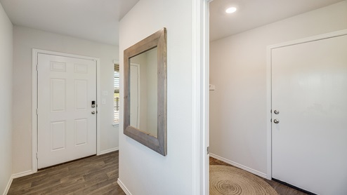 Floresville Links at River Bend New Construction Homes large entry way to open floor concept easy access to utility room