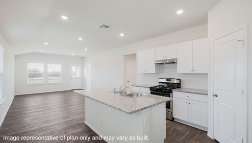 Floresville Links at River Bend New Construction Homes white cabinets open concept kitchen and living room