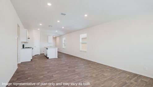 Floresville Links at River Bend New Construction Homes open kitchen overflowing into dining and living area