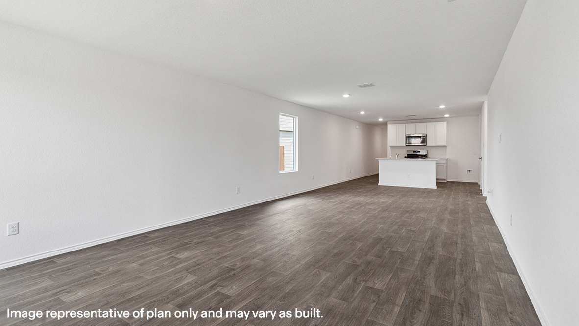 Living room with brown flooring.