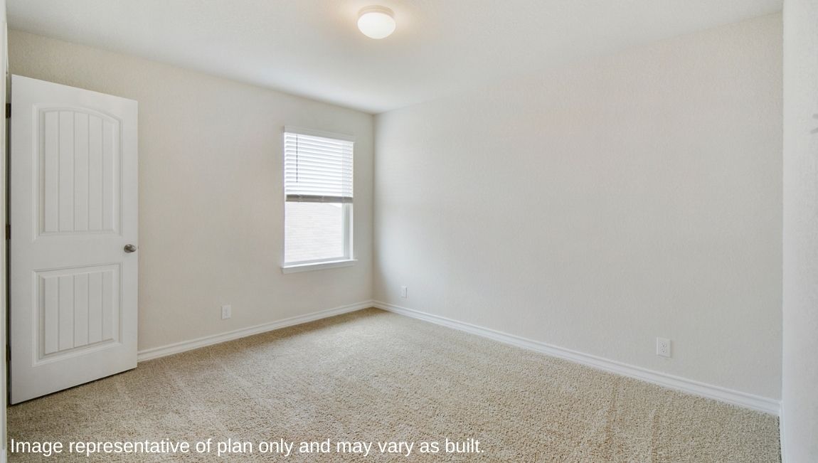 Bedroom with a window and a closet.