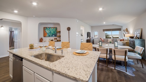 DR Horton Converse Avenida 5318 la rambla model the bryant floor plan 1703 square feet spacious kitchen island overlooking open concept dining and living room area