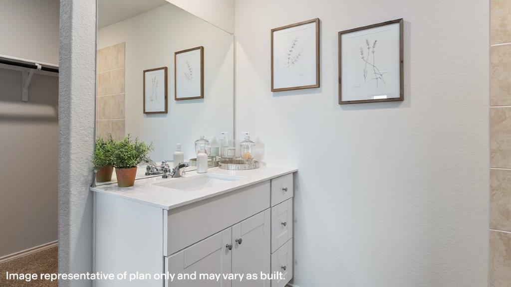 Bathroom with a single vanity sink.