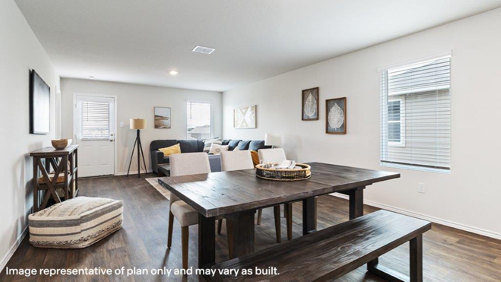 Dining area in between living room and kitchen.
