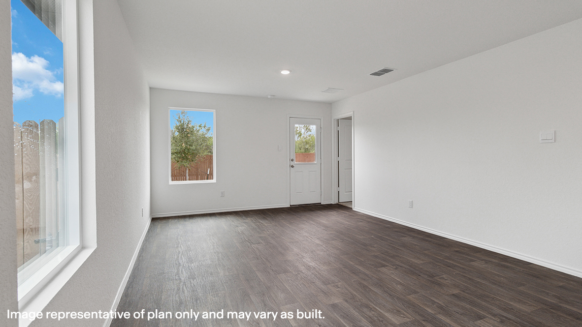 Living room with windows for natural lighting.