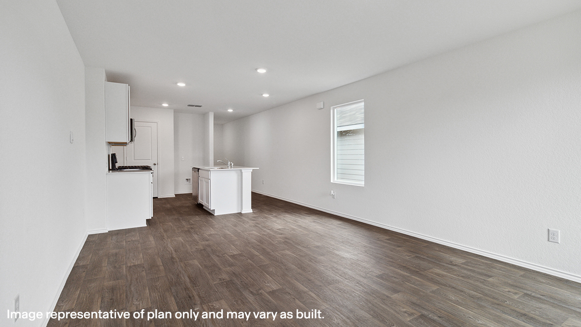 Living room with brown flooring.