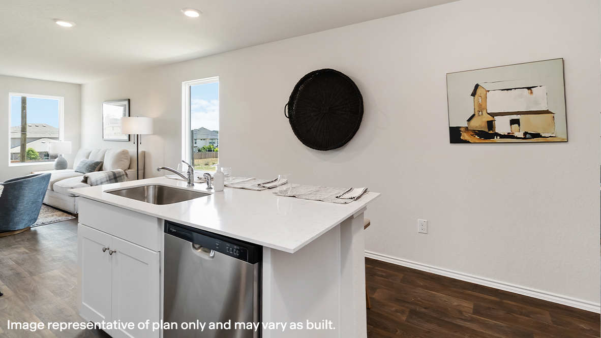 Kitchen with stainless steel appliances.