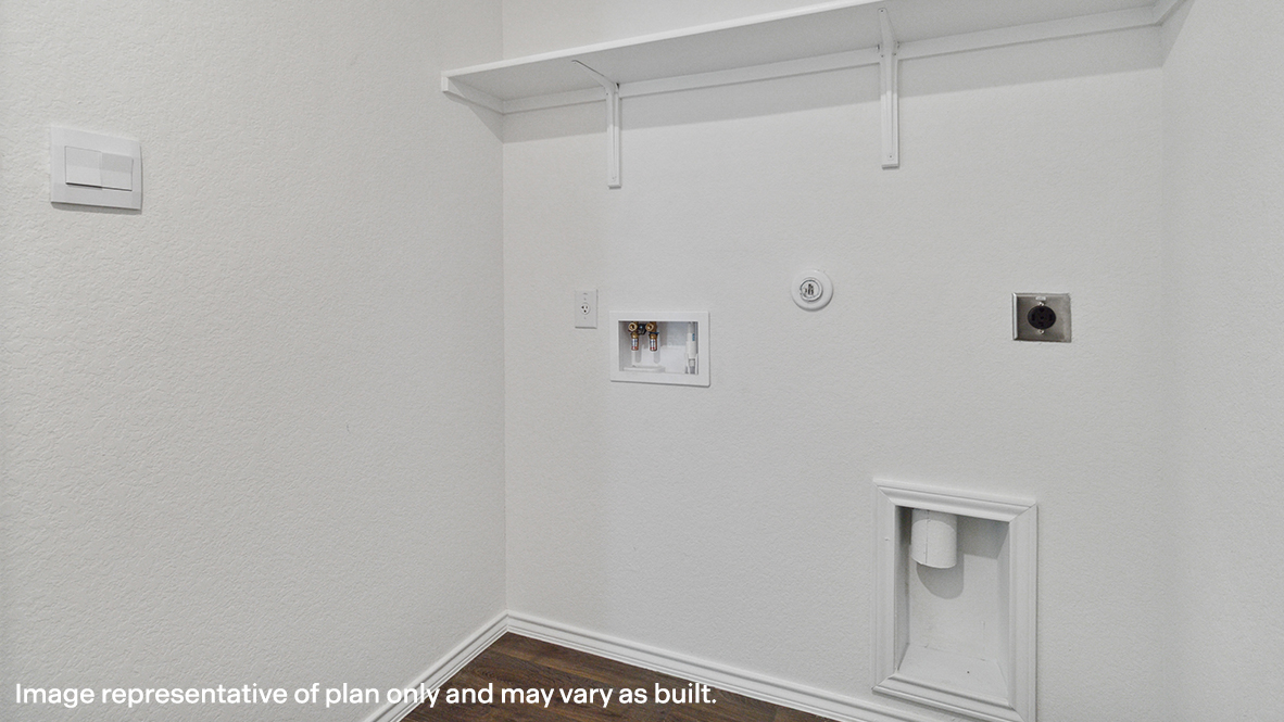 Laundry room with shelving.