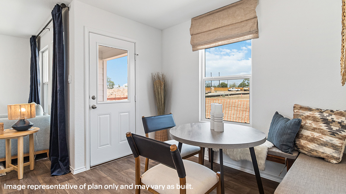 New home features a breakfast nook, dining area tucked beside the kitchen with upgraded flooring