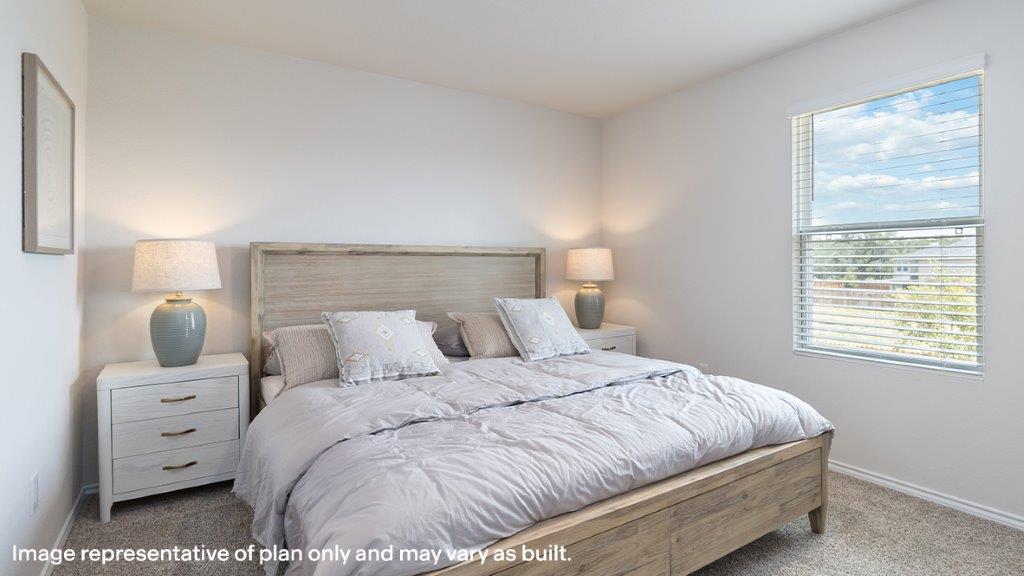 Primary bedroom alternate angle highlighting usable space and furniture placement at Sereno Springs