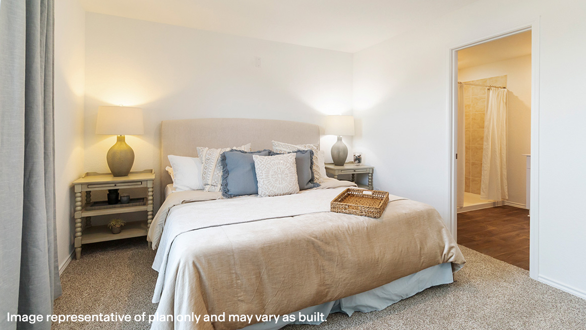 Owner’s suite offers natural window light, spa-inspired ensuite bathroom, backyard view, walk-in closet for everyday style