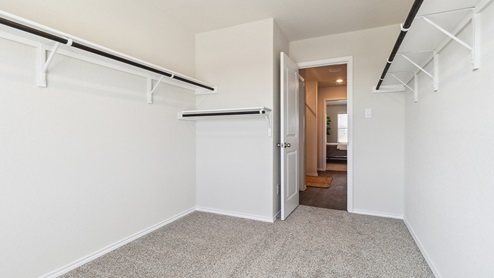 Hacienda Model Primary walk-in closet.