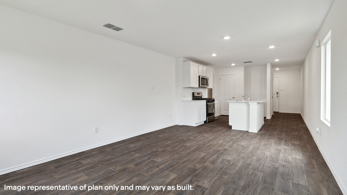 Open concept first floor with the living room, dining room and kitchen next to each other