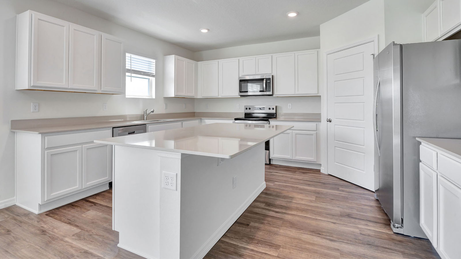 Kitchen with large island and counter space